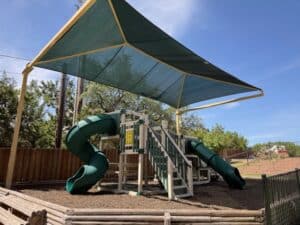 Cantilever shade over Austin playground